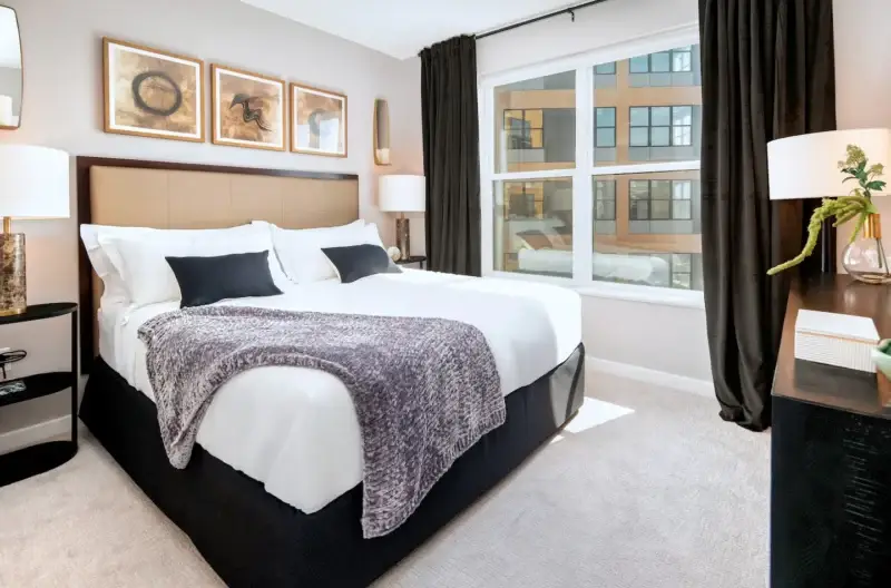 Hyatus furnished apartment bedroom and living space